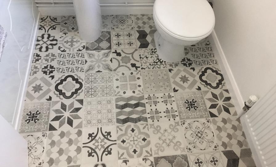 Bathroom floor tile fitting Rugby